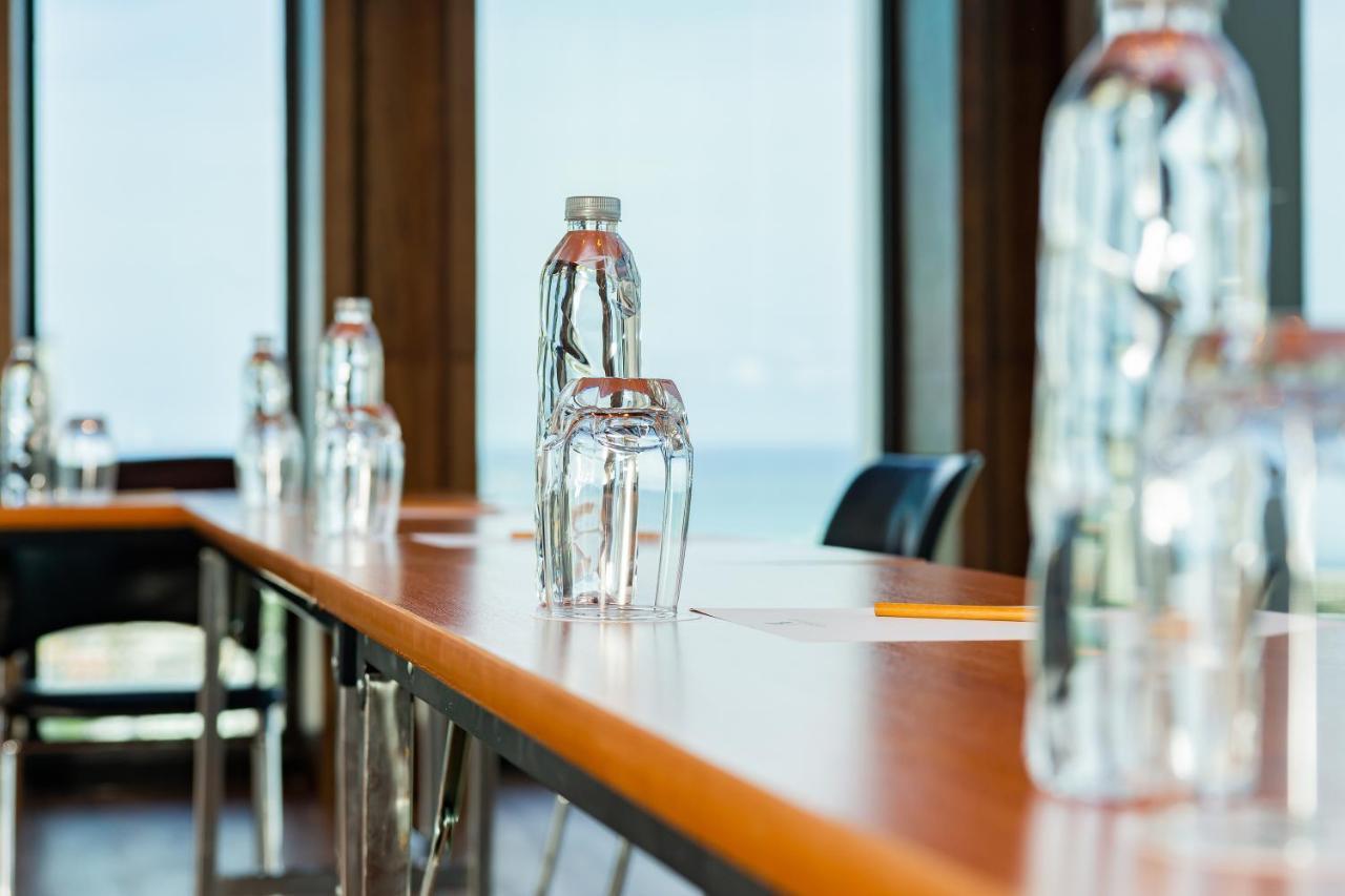 Arbour Hotel&Residence Pattaya Exterior foto Bottled water on a table